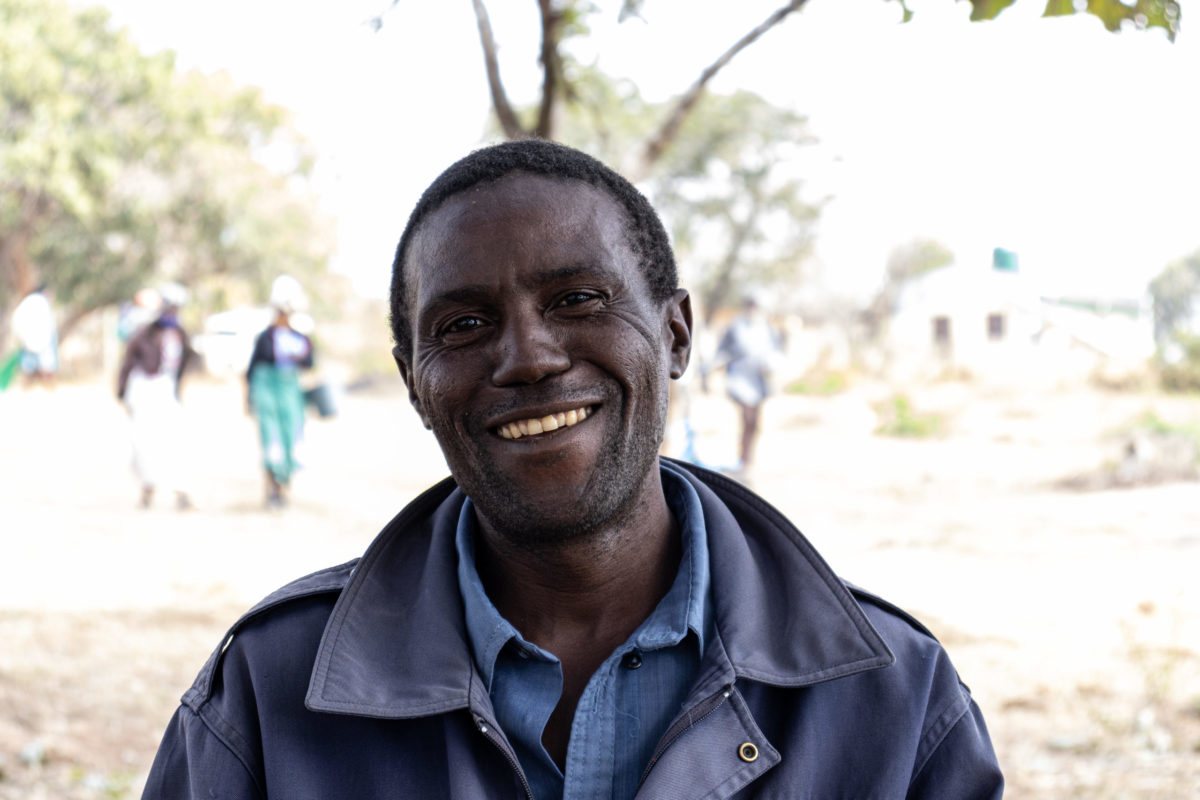 May 31, 2021: Gondokondo village headman, Anthony Gondokondo, smiles into the camera in Zaka district. © Charmaine Chitate/ CARE