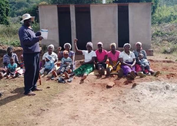 July 4, 2022: Tinofara Community Health Club proudly celebrating the completion of the 16th latrine in their village. © Mercy Jamba/ CARE